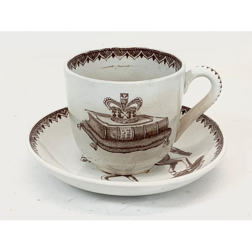 463 - A Victorian William III Commemorative cup and saucer. Saucer measures 15cm