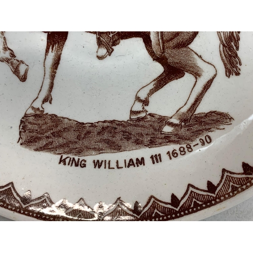 463 - A Victorian William III Commemorative cup and saucer. Saucer measures 15cm