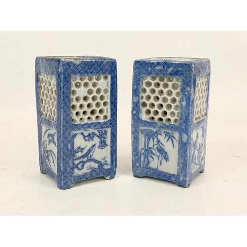 469 - A pair of late 19th century Chinese reticulated vases. 9.5cm