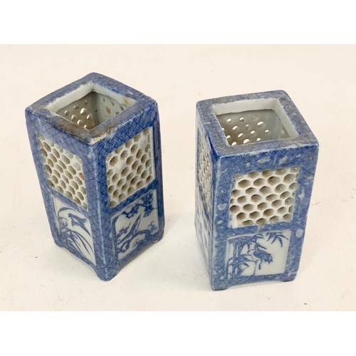 469 - A pair of late 19th century Chinese reticulated vases. 9.5cm