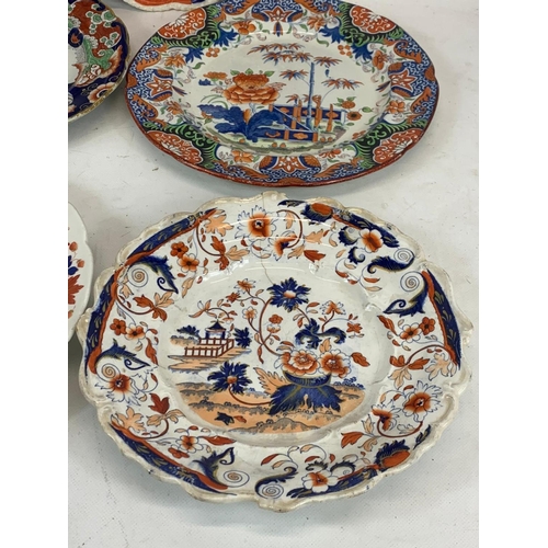 470 - 8 19th century plates. Mostly by Mason’s and a Chelsea Imari pattern. 26cm