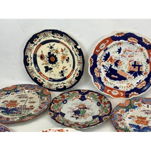 470 - 8 19th century plates. Mostly by Mason’s and a Chelsea Imari pattern. 26cm