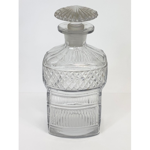 473 - A pair of late 19th century cut glass decanters. 17cm