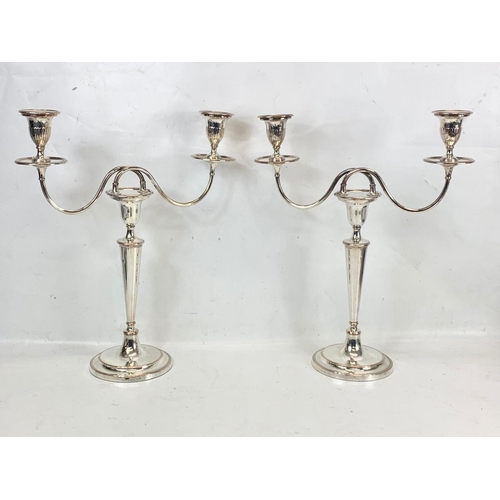 474 - A pair of large Edwardian silver plated candelabras. 35 x 42cm