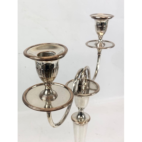 474 - A pair of large Edwardian silver plated candelabras. 35 x 42cm