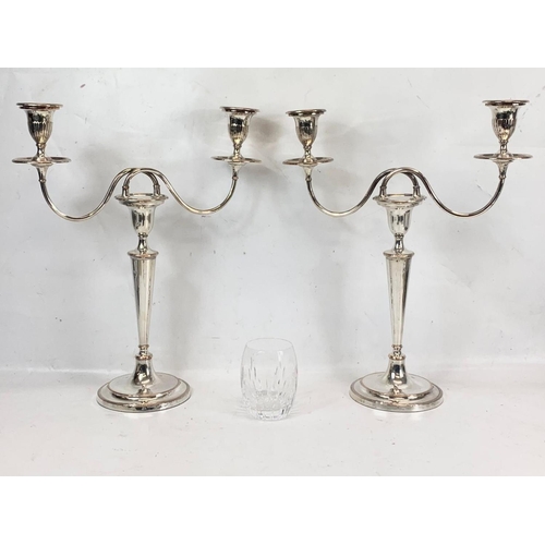 474 - A pair of large Edwardian silver plated candelabras. 35 x 42cm