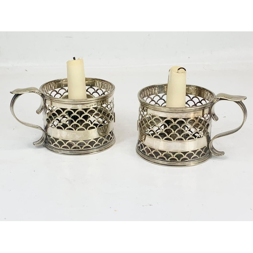 476 - A pair of late Victorian silver plated candleholders, H.E & Co. 13 x 7cm.