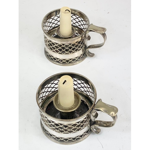 476 - A pair of late Victorian silver plated candleholders, H.E & Co. 13 x 7cm.