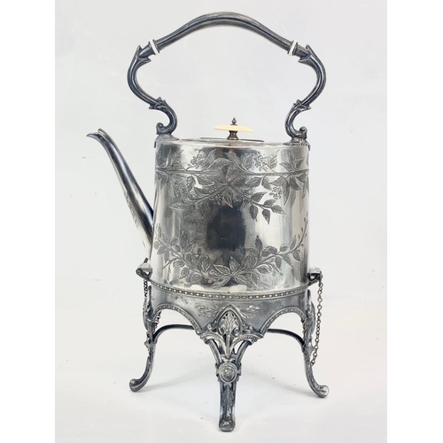 477 - A large Victorian silver plated spirit kettle, by Silber & Fleming. 44cm