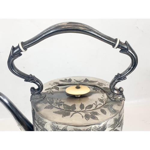 477 - A large Victorian silver plated spirit kettle, by Silber & Fleming. 44cm