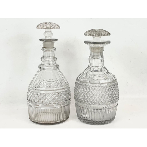 478 - 2 Georgian cut glass decanters. 27cm