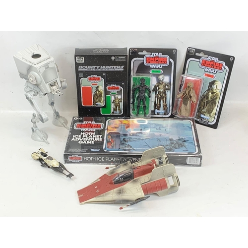 48 - A collection of Star Wars toys. Including an unopened Star Wars Empire Strikes Back Hoth Ice Planet ... 