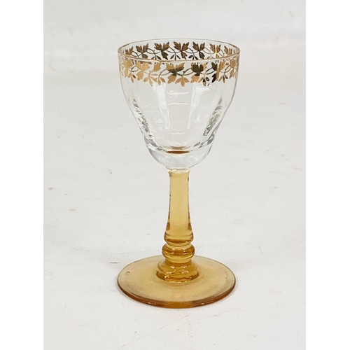 490 - A set of 6 vintage gilt crystal and amber drinking glasses. 9cm