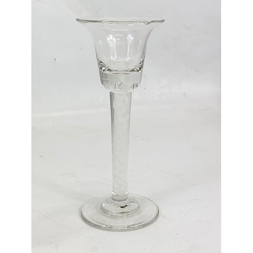 491 - A quantity of early to late 19th century glassware. Including a Georgian twist flute candleholder 16... 