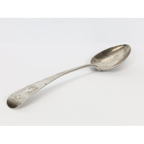 494 - A large George III silver table spoon. 1811. 61 grams. 22cm