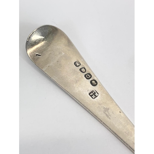 494 - A large George III silver table spoon. 1811. 61 grams. 22cm