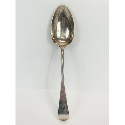 494 - A large George III silver table spoon. 1811. 61 grams. 22cm