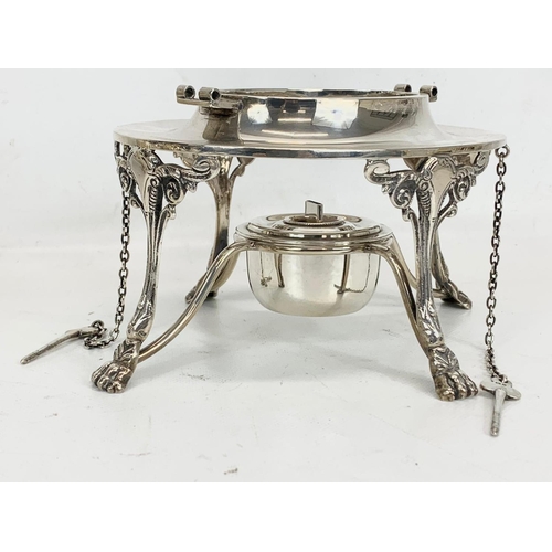 496 - A sterling silver spirit kettle. Birmingham 1907. 1075 grams. 32cm