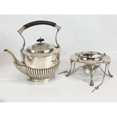 496 - A sterling silver spirit kettle. Birmingham 1907. 1075 grams. 32cm