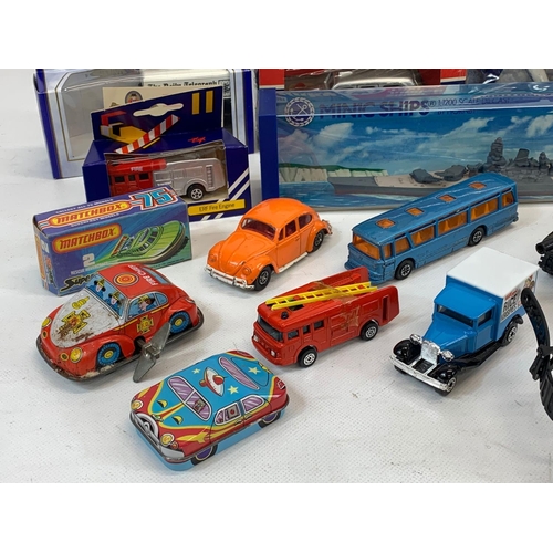 5 - A collection of model cars and toys etc. Including a Dinky Silver Jubilee Taxi in box, a Corgi Junio... 