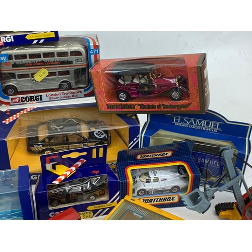 5 - A collection of model cars and toys etc. Including a Dinky Silver Jubilee Taxi in box, a Corgi Junio... 