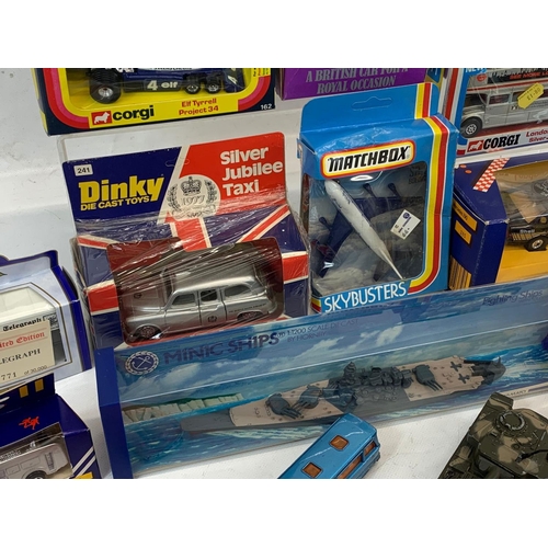 5 - A collection of model cars and toys etc. Including a Dinky Silver Jubilee Taxi in box, a Corgi Junio... 