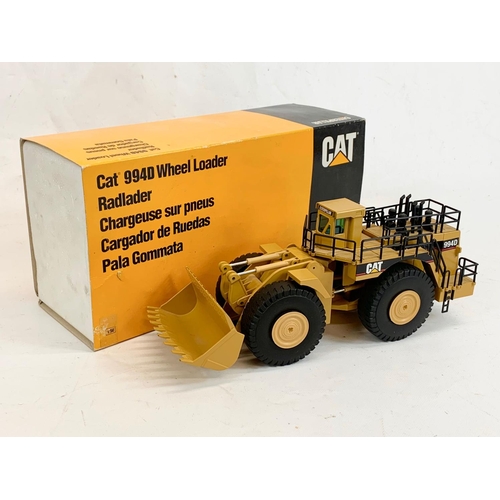 54 - A Caterpillar CAT 994D Wheel Loader model in box. Model measures 33 x 14cm. Box measures 37.5 x 13.5... 