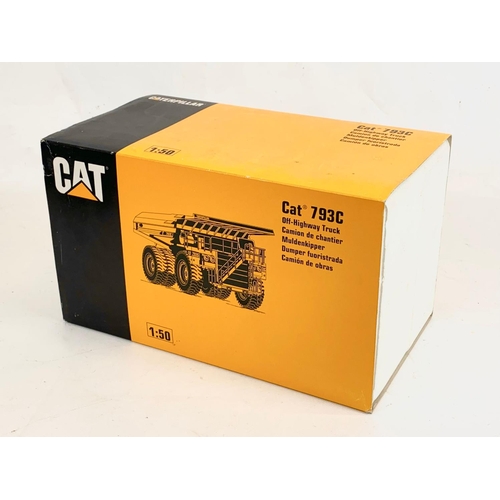 55 - A Caterpillar CAT 793C Off-Highway Truck model in box. 1:50. Model measures 27 x 15 x 13cm. Box meas... 