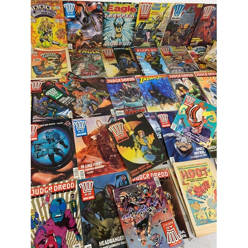 59 - A large collection of vintage comic books. 2000 AD Judge Dredd.