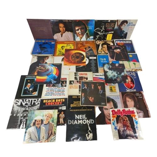 62 - A collection of LP, vinyl records. Rolling Stones, Elvis, Neil Diamond, Beach Boys, Frank Sinatra, S... 