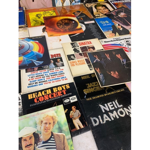 62 - A collection of LP, vinyl records. Rolling Stones, Elvis, Neil Diamond, Beach Boys, Frank Sinatra, S... 