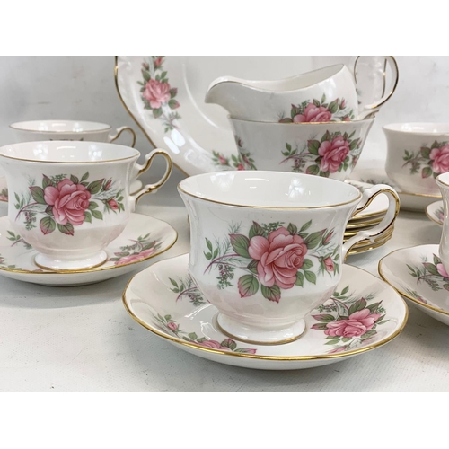 629 - A 21 piece Queen Anne tea set.