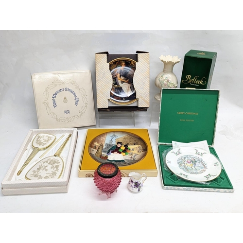 775 - A sundry lot including 2 Royal Doulton plates, Royal Worcester Christmas plate, a Belleek vase, etc.