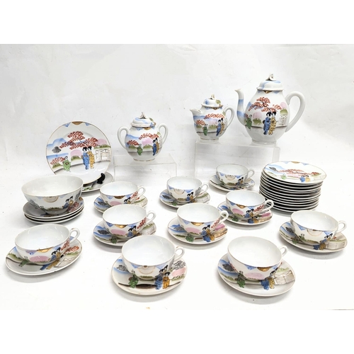 778 - A 41 piece Japanese tea set.