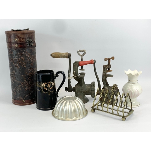 778A - A sundry lot. Including 2 vintage mincers, a Belleek vase, a Gibson & Sons jug, wine bottle holder e... 