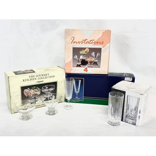 779 - 4 box sets of crystal glasses. Including a box of 4 Royal Doulton Hi-ball Tumblers, a 4 piece Desser... 