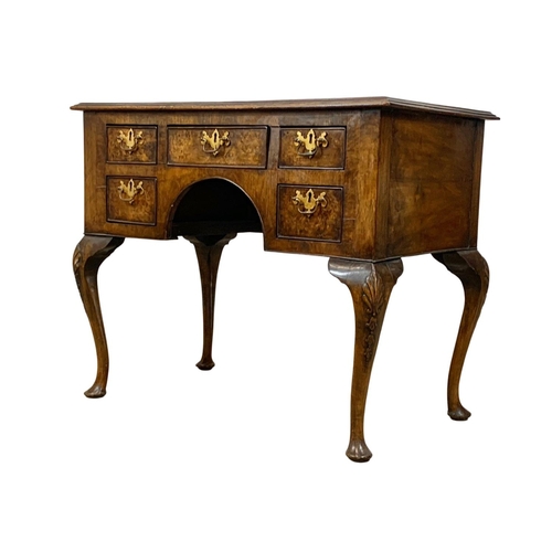 784 - A mid 19th century George I style burr walnut lowboy. 92 x 53 x 75cm