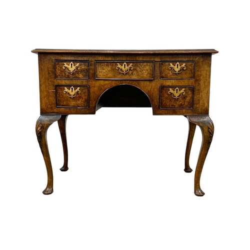 784 - A mid 19th century George I style burr walnut lowboy. 92 x 53 x 75cm