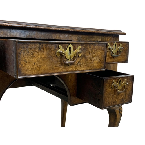 784 - A mid 19th century George I style burr walnut lowboy. 92 x 53 x 75cm