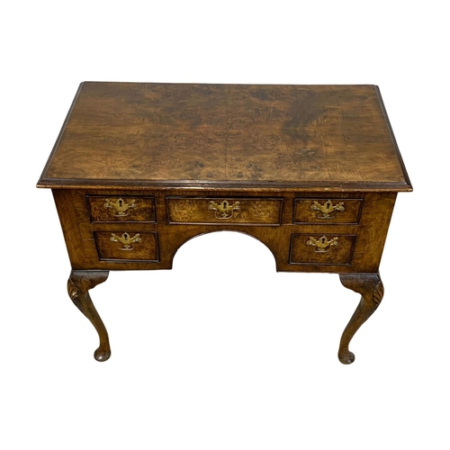 784 - A mid 19th century George I style burr walnut lowboy. 92 x 53 x 75cm