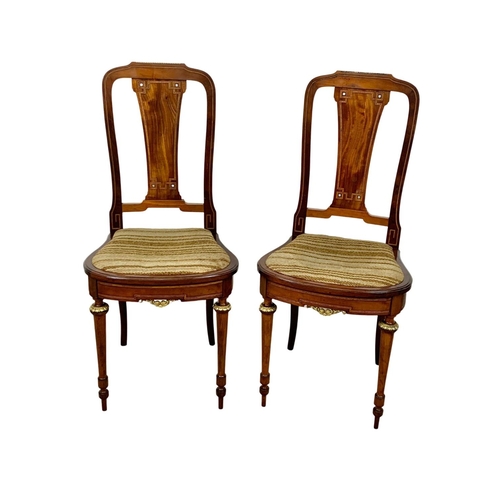 785 - A pair of good quality late 19th century French inlaid mahogany high back side hall chairs with bras... 