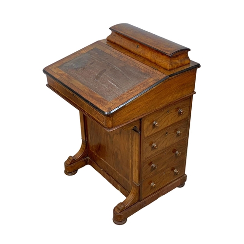 787 - A Victorian burr walnut Davenport desk with birds eye maple interior. Circa 1870. 53 x 53 x 76cm