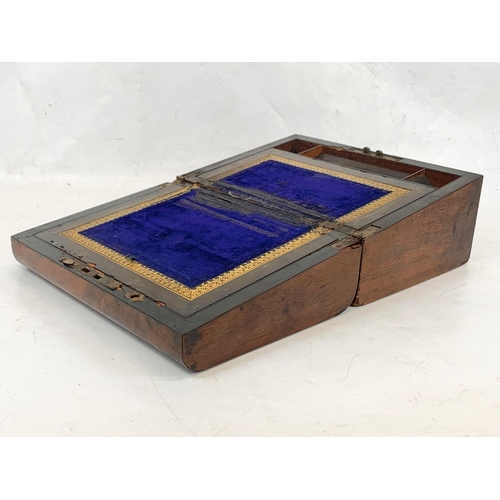 79 - A Victorian walnut writing box with key and mother of pearl inlay. Closed 30 x 22 x 15cm