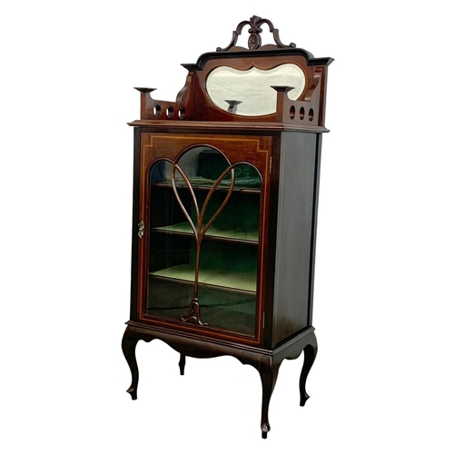 791 - An Edwardian inlaid mahogany mirror back music cabinet. 61 x 37 x 140cm