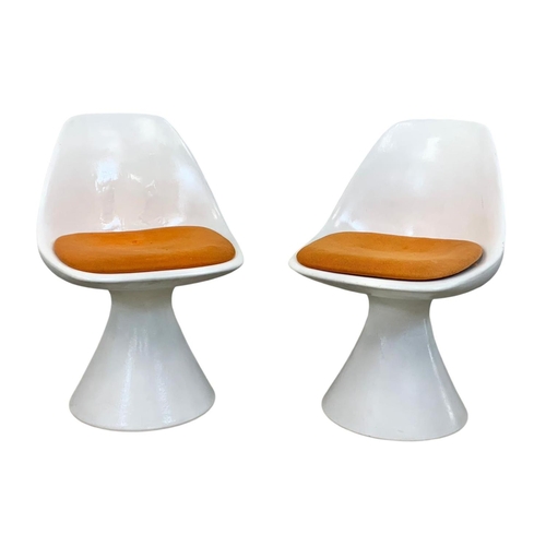 794 - A pair of Arkana “Mushroom” tulip chairs designed by Maurice Burke. Mid Century. 1960’s-1970’s.