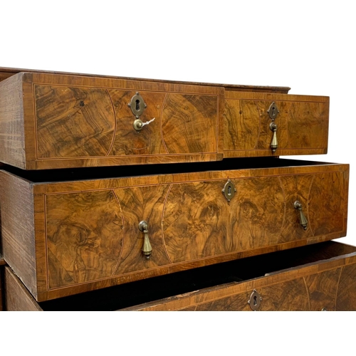 798 - An original early 18th century George I inlaid walnut chest of drawers, in bracket feet. Circa 1720.... 