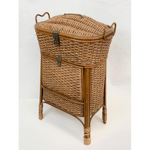 81 - A tall Edwardian wicker sewing basket. 43 x 67cm