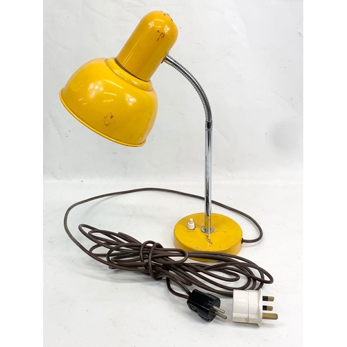 83 - A Scandinavian angle poised desk lamp. European plug. 44cm.