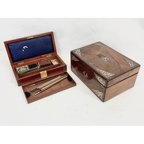 86 - A Victorian rosewood jewellery box with mother or pearl inlay, and a vintage mahogany desk top box. ... 