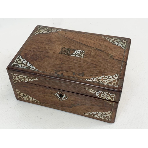 86 - A Victorian rosewood jewellery box with mother or pearl inlay, and a vintage mahogany desk top box. ... 